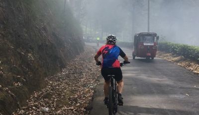 Ms Alison Osborne Cycling on the  tour with redspokes